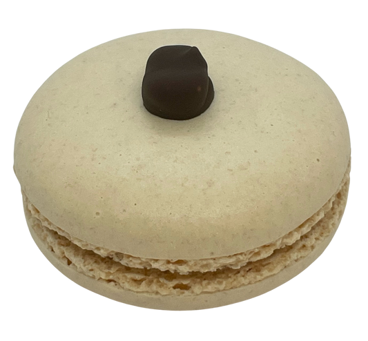 Golden Macaron Shell filled with dark chocolate ganache and topped with a chocolate covered espresso bean