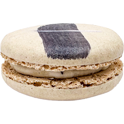 A light coloured macaron with a painted swipe of dark grey and a light filling