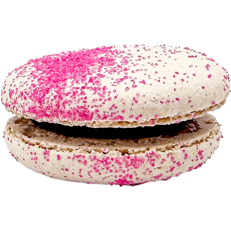 A white macaron coated in bright pink sprinkles, sandwiching berry coloured filling