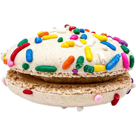 A light coloured macaron with multicoloured sprinkles and a light coloured filling