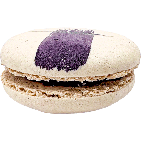 A light coloured macaron with a painted swipe of purple and a dark purple filling